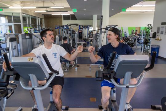 Students working together at the rec center