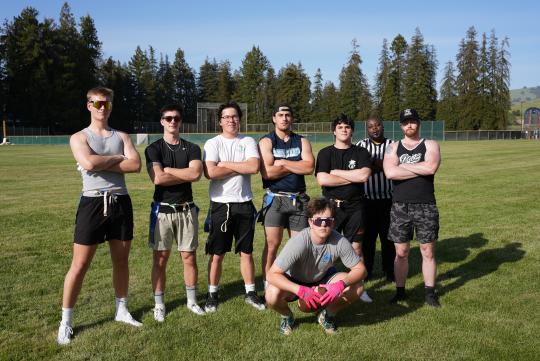 A team of flag footballers pose together