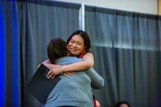 Student and Professor Hugging