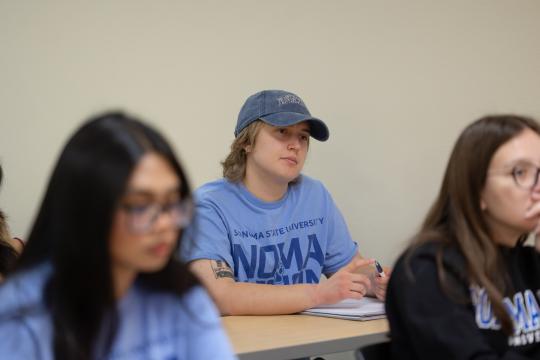 Students listen to lecture