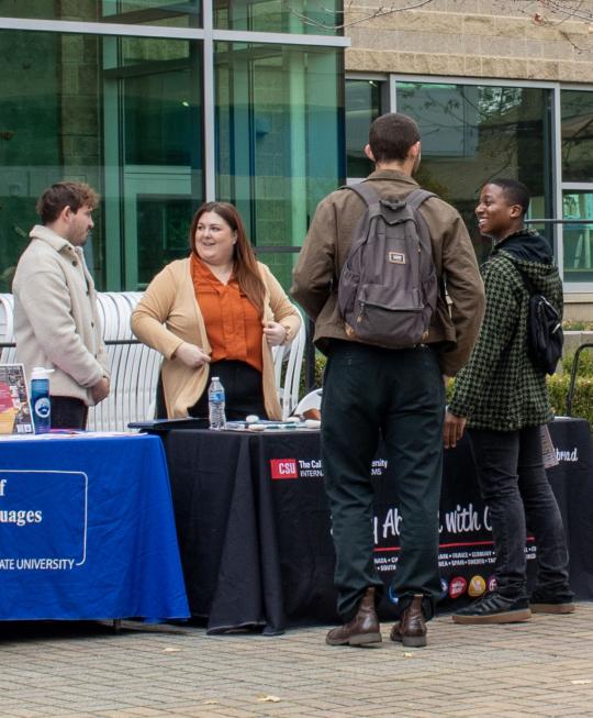 Group gathers at study away table