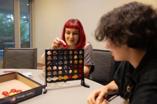View of a student playing connect four