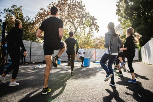 Group warming up for a run