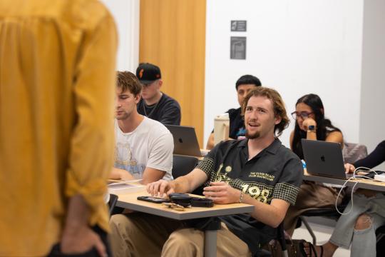 Students contribute to lecture discussion