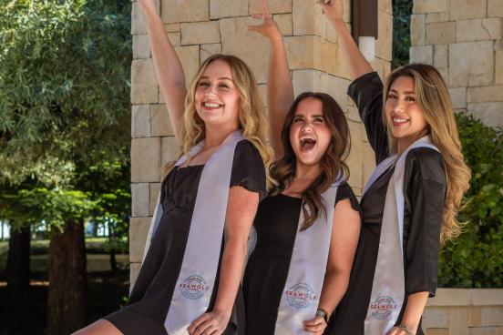 Seawolf living posing for graduation photoshoot