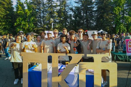 Fraternity tabling at meet the greeks