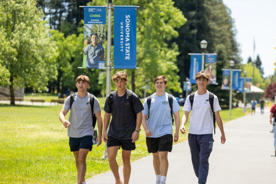 Students walking to salazar plaza
