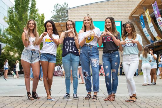 Sorority taking a photo at SSU seawolf plaza