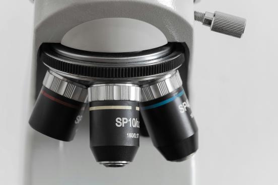 front of a microscope
