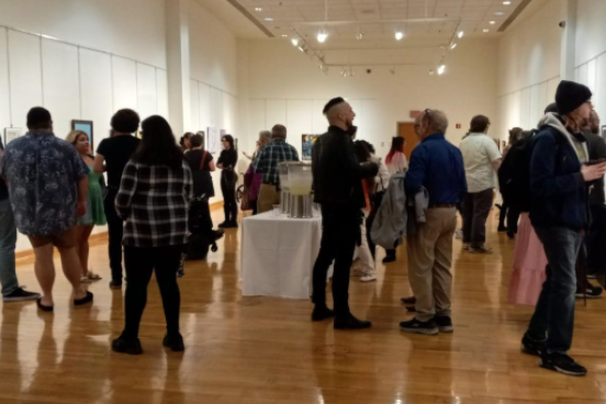 Crowd of people in art gallery