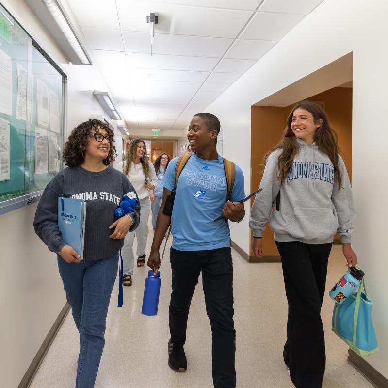 Group of students walking and talking 