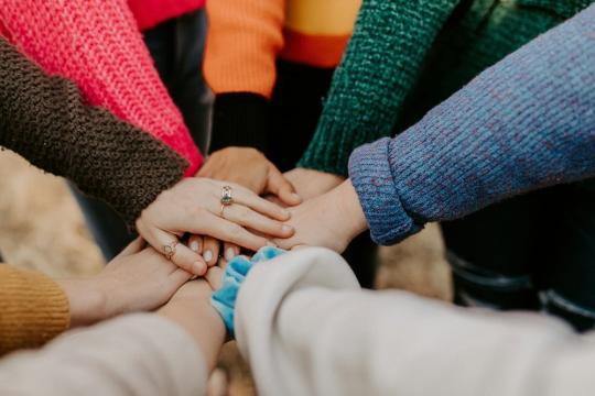 Hands together symbolizing team