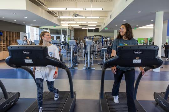 Student talking about seawolf living while working out
