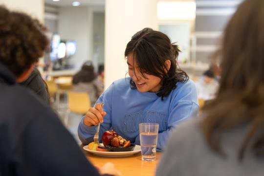 Student saving money by having a meal plan