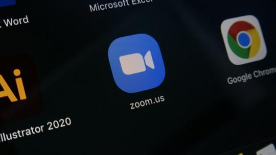 Student's phone screen focused on zoom logo