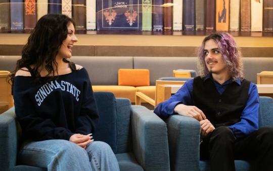 students laughing at the student center lobby