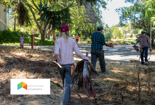 Students helping outdoors