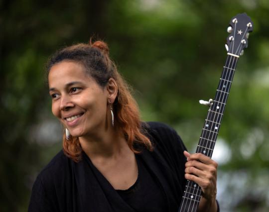 Rhiannon Giddens with guitar