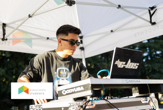 DJ playing at night at the plaza