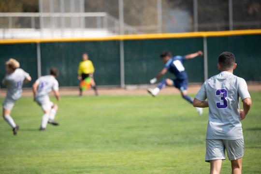playing soccer