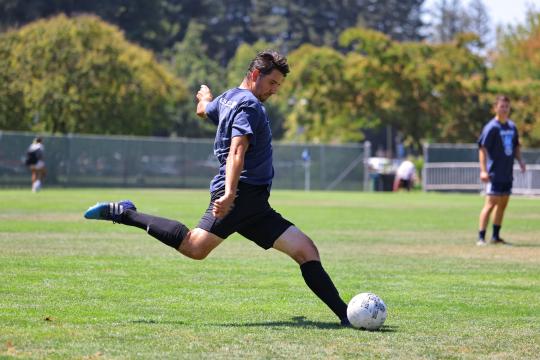 men playing soccer
