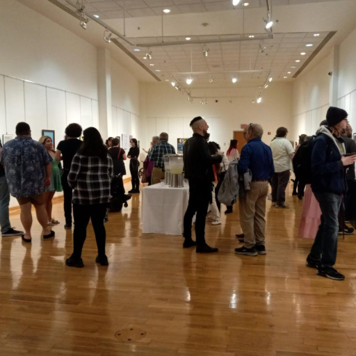 Crowd of people in art gallery